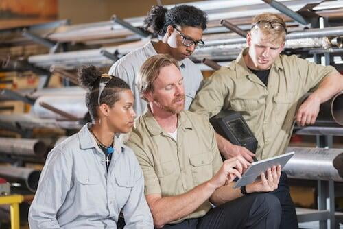 Supervisor and welder with iPad